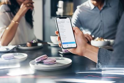 Home Connect App being used on a mobile in a cafe