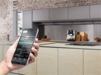 Siemens virtualBrochure app used in action on a smartphone, with the kitchen design being brought to life in augmented reality