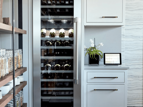 Front shot of Thermador wine refrigerator and wine collection