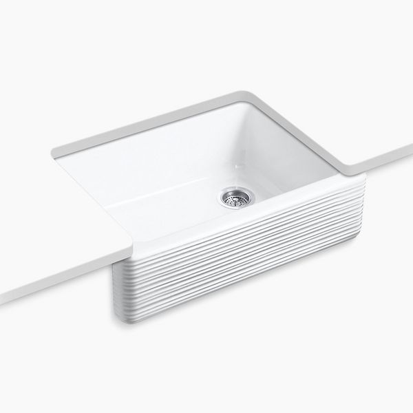 Kohler white sink with ridged front detail
