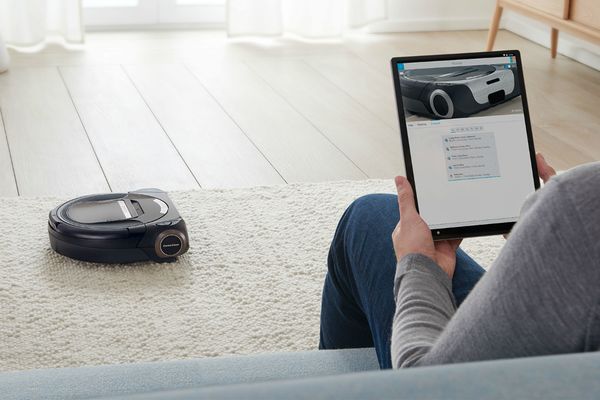 Приложение Home Connect с изображением зон, где роботу-пылесосу можно убирать.