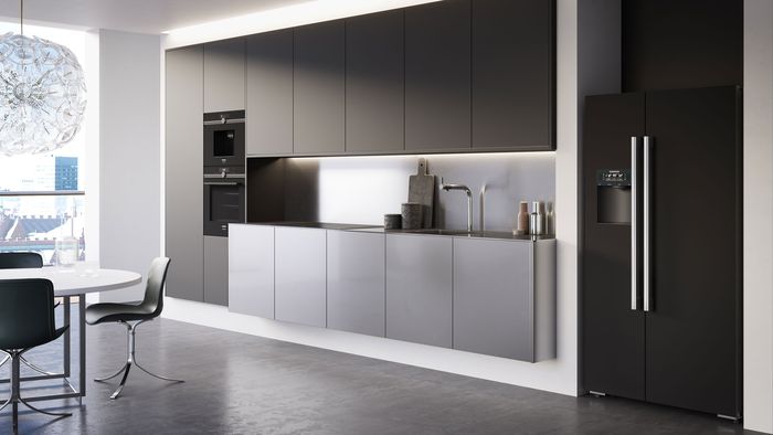 Monochrome kitchen row with appliances