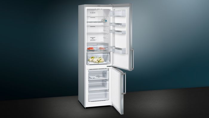 Open fridge and freezer door showing inside contents