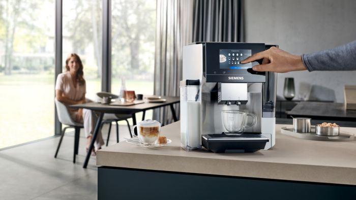 EQ700 coffee machine being used