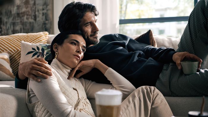 Couple on a sofa in a living room