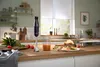 Bosch kitchen appliances including a hand blender, blender, and hand mixer with beaters.