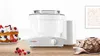 Bosch Food Mixer alongside fruits and pastries on countertop