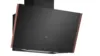 Black angled range hood with wood trim and touch controls on the front panel.