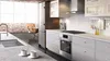Benchmark series appliances in grey and white themed kitchen