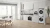 Bosch washing and dryer machines next to Bosch kitchen appliances