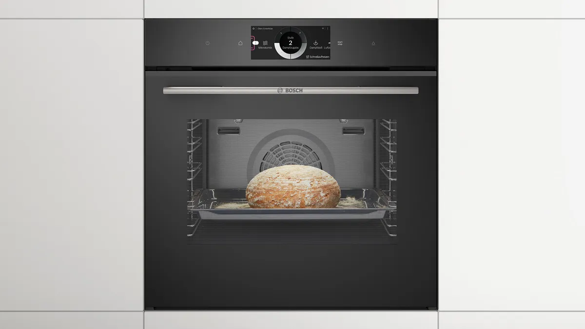 Et brød bakes i en innebygd ovn med dampfunksjon.