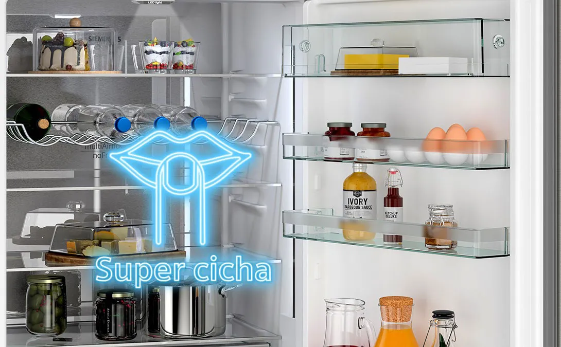 wnętrze lodówki z produktami i grafiką "super cicha"