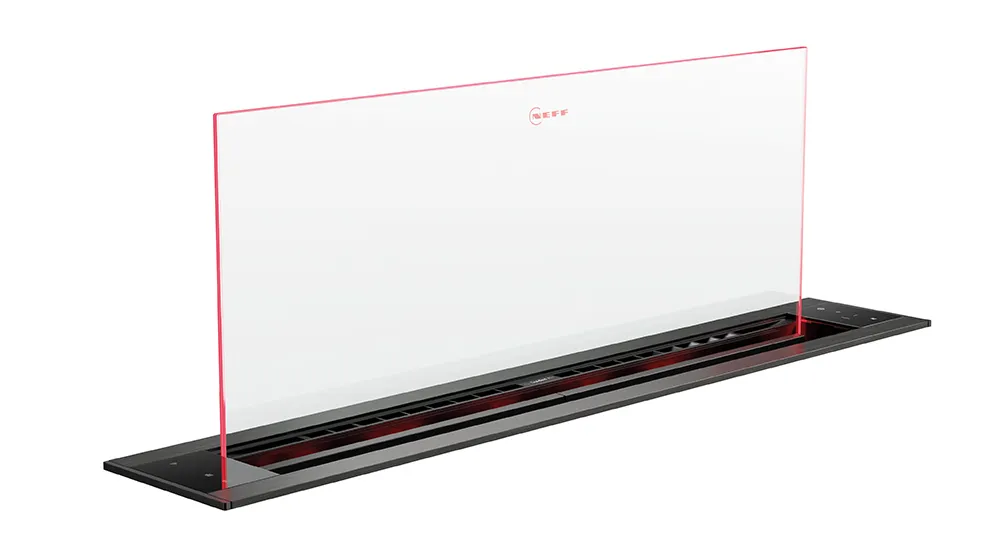 View of a modern, minimalist kitchen hood with a transparent glass panel and a sleek black base, featuring touch controls for easy operation.