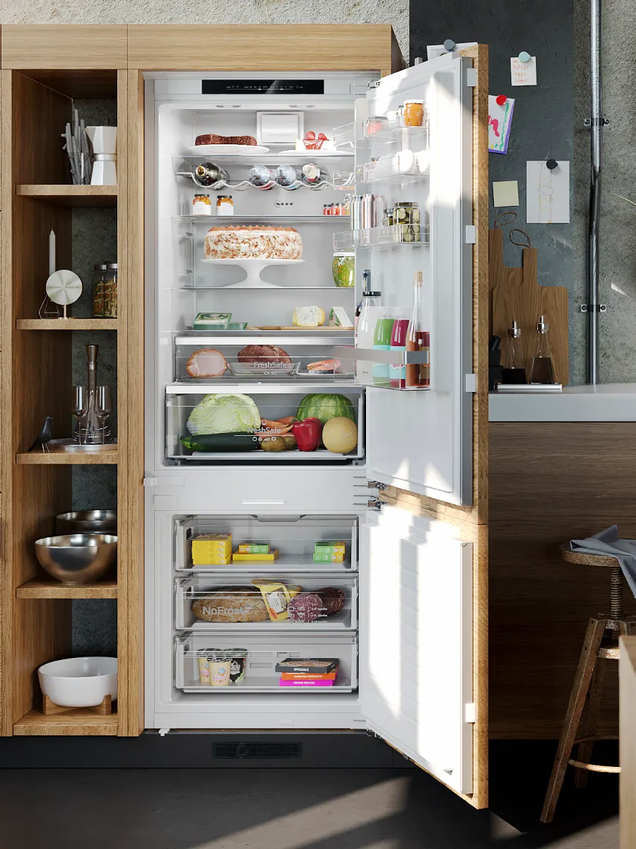 Ένας μεγάλος λευκός ψυγειοκαταψύκτης NEFF, γεμάτος με τρόφημα.