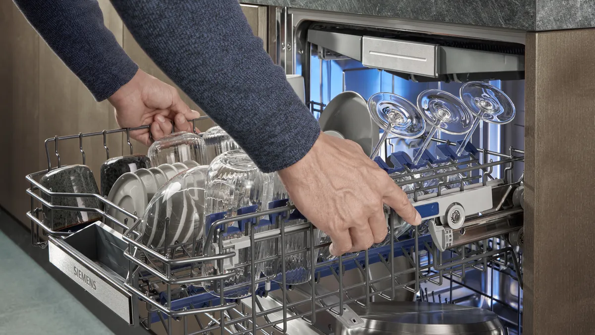 Dishwashers with flexible baskets and third racks
