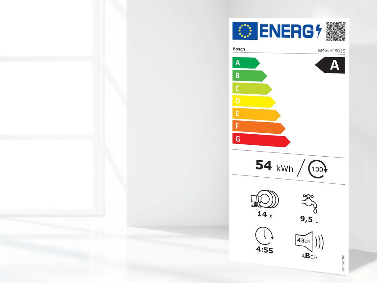 The energy label showing class A stands in a brightly lit, white space.