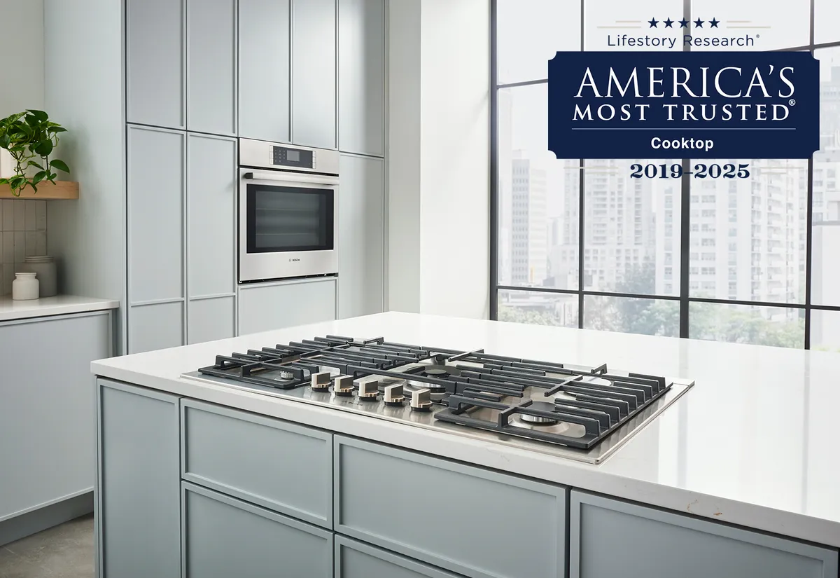 A kitchen featuring a sleek black induction cooktop