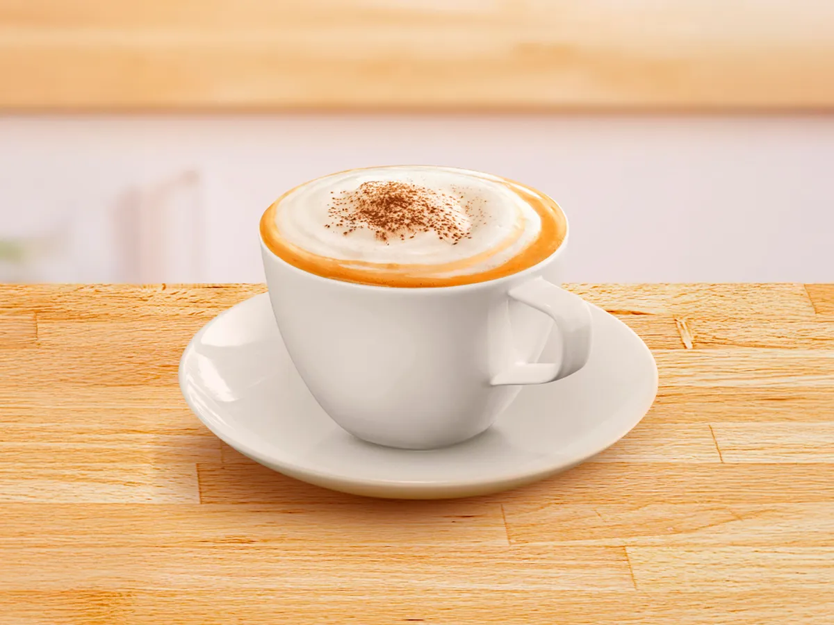 Coffee cup filled with cappuchino