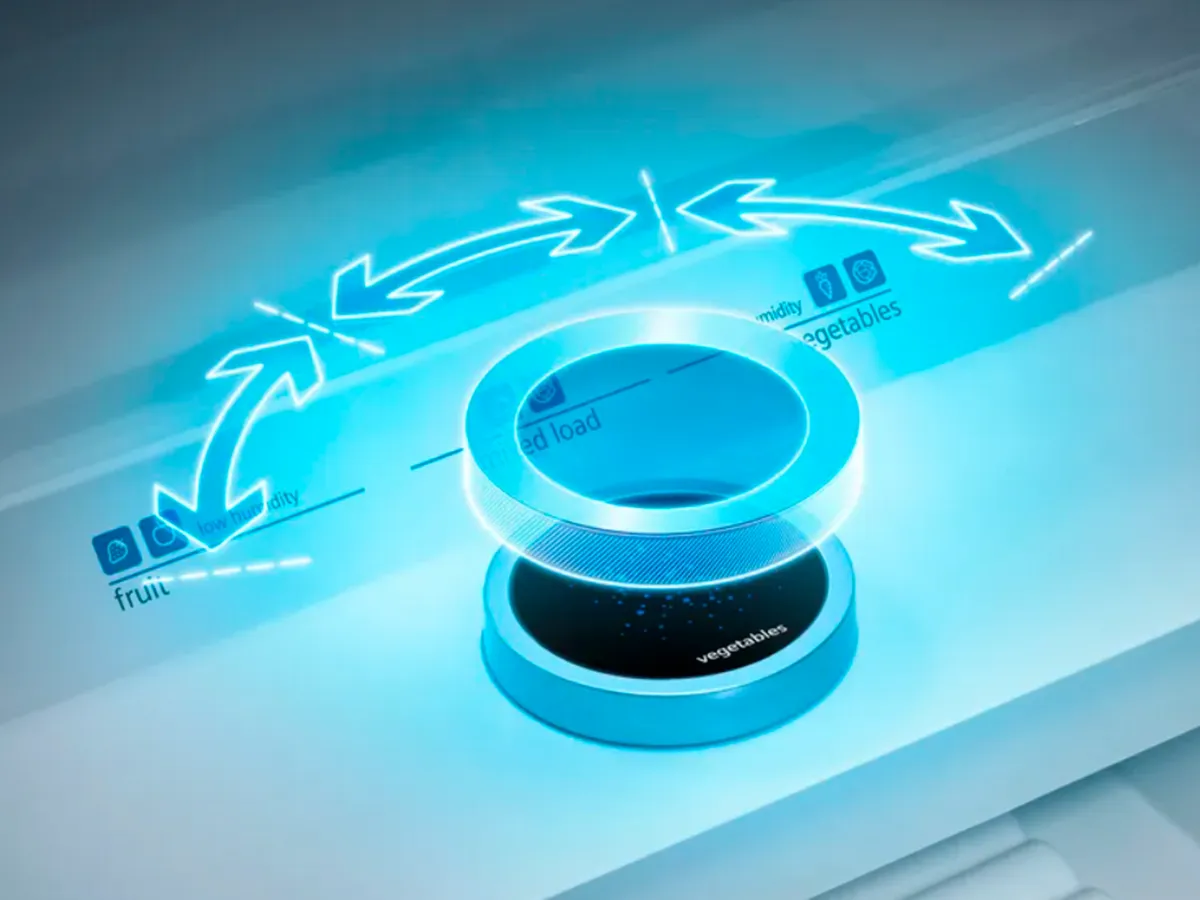 Botão de controlo do compartimento do frigorífico Siemens com uma sobreposição gráfica azul com setas para indicar a rotação.