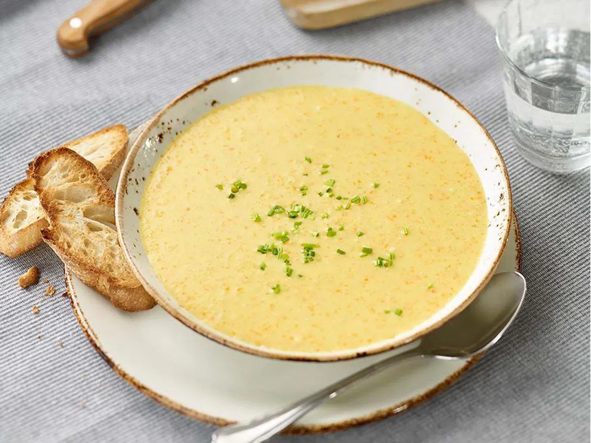 An Austrian favourite: thickened semolina soup with hints of nutmeg and sweet cream, topped with chives.