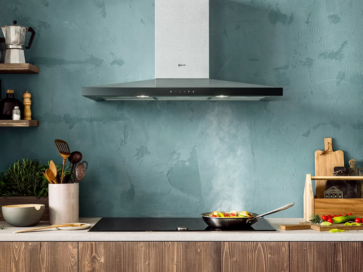 Pyramid hood shown with steaming pan 