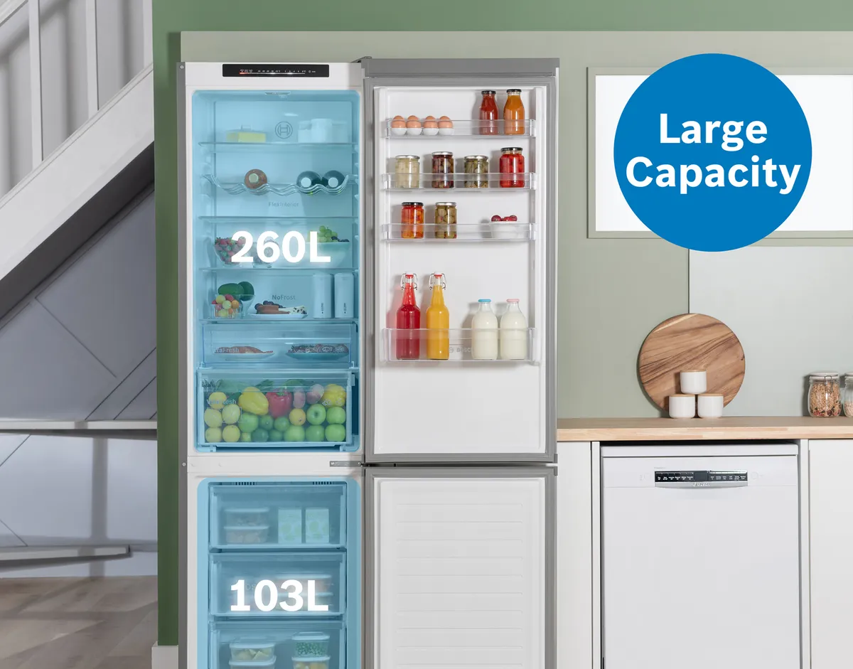 Open fridge freezer in kitchen with white text overlay showing 260L