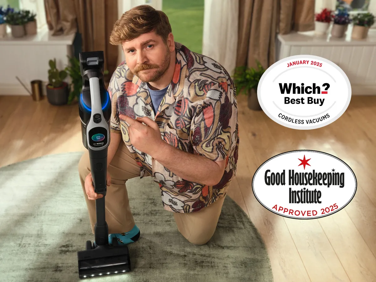 Man holding an Unlimited 10 with the Which Best Buy badge overlay