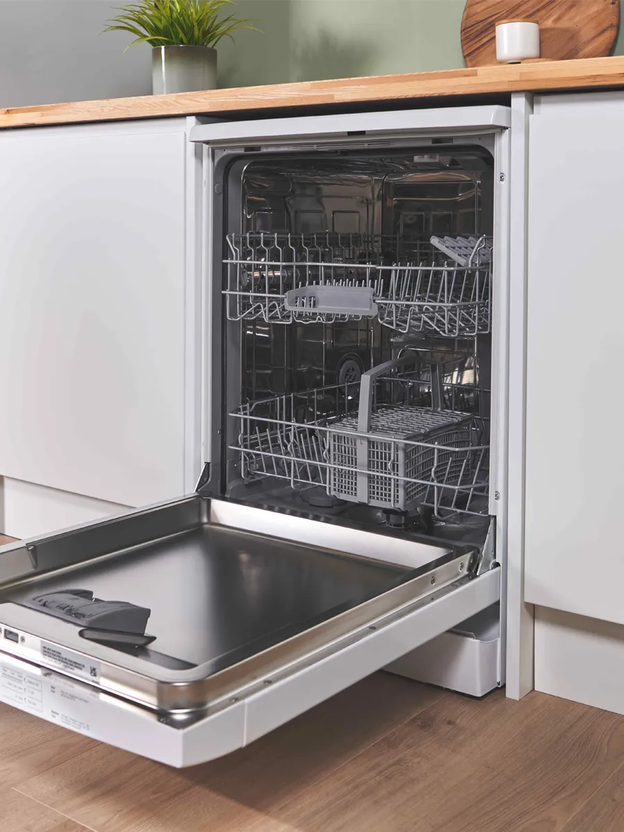 Open dishwasher placed under counter
