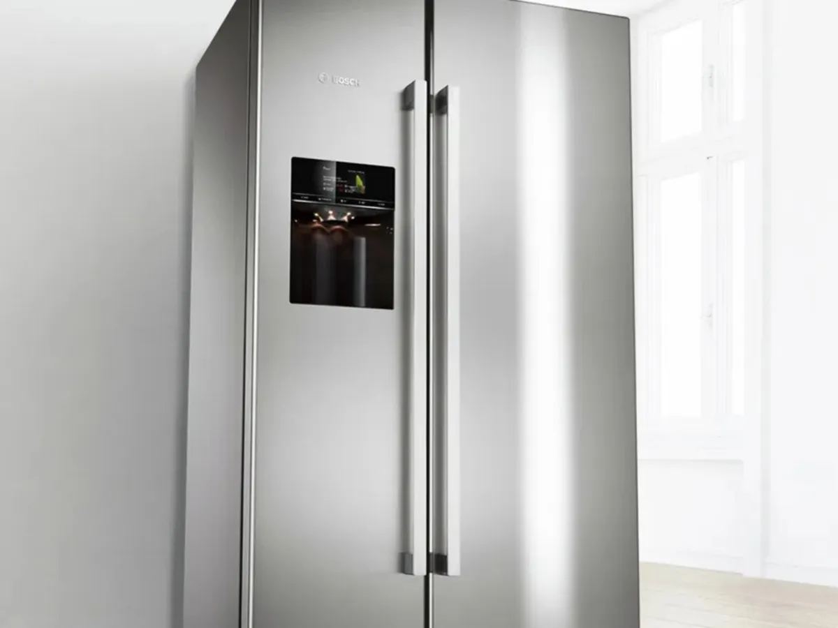 A closeup of an American side-by-side with an ice and water dispenser.