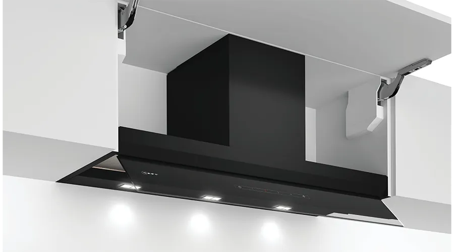 A sleek, modern kitchen under-cabinet range hood with a white surface, metal body, and integrated lighting for efficient ventilation.