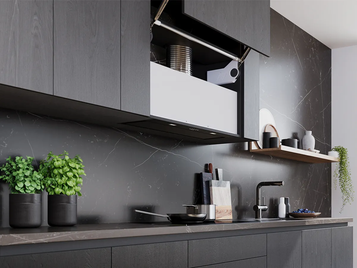 Canopy hood in dark themed kitchen