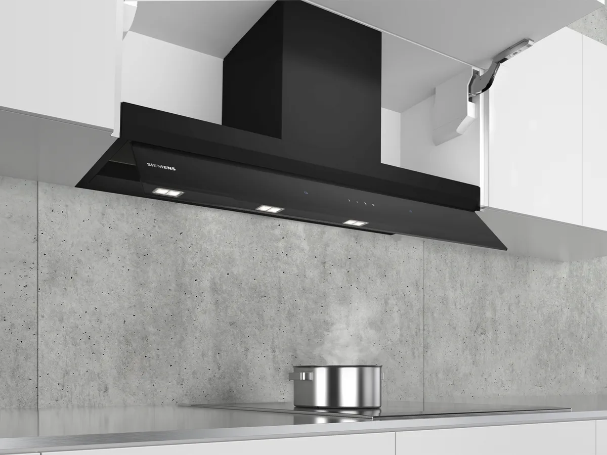 Integrated kitchen hood in a grey kitchen setting