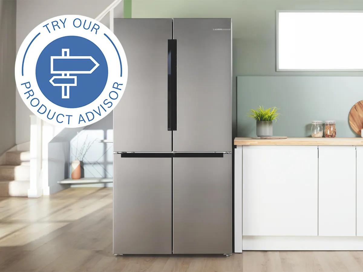 Closed fridge freezer in neutral kitchen 