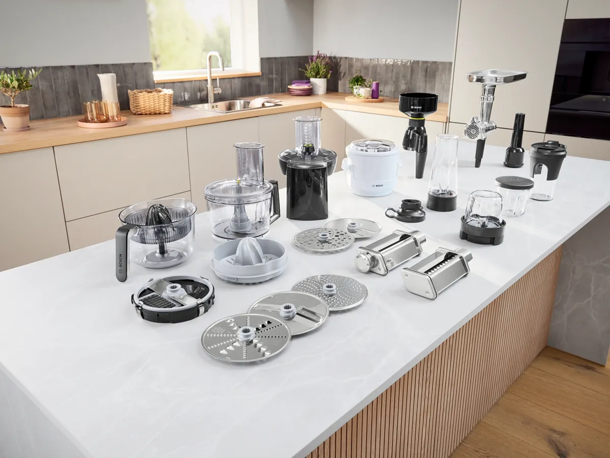 Bosch stand mixer attachenments at a glance on a kitchen counter.