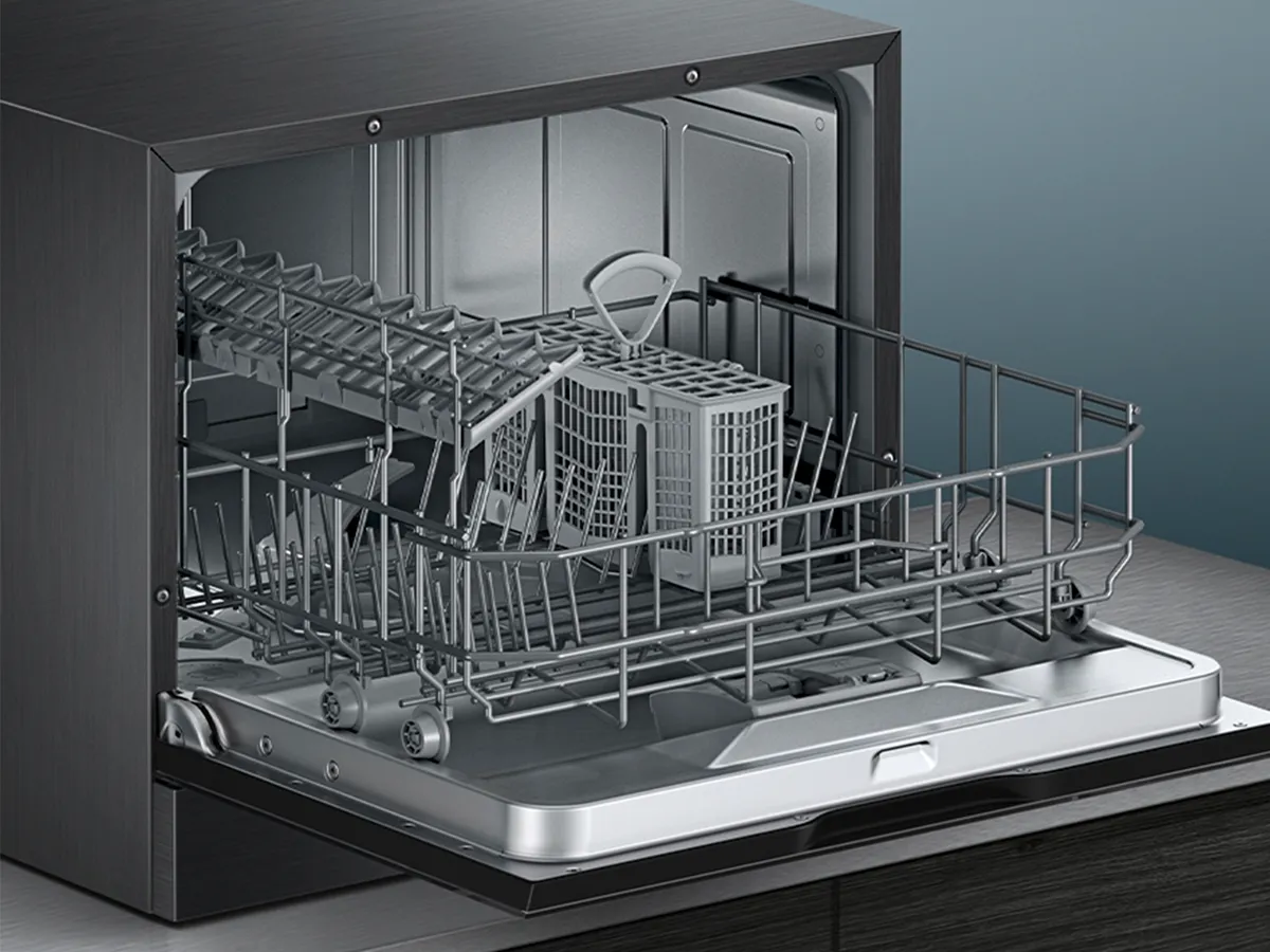 Open compact dishwasher.