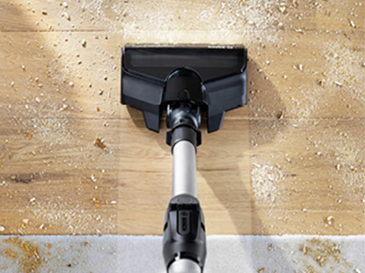 Unlimited vacuum cleaner being used on carpet and wooden flooring