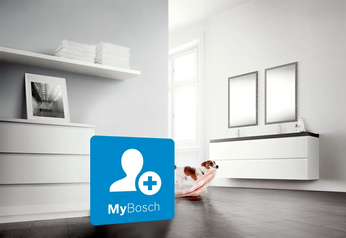 Moderna badrum med MyBosch-logotyp, hyllor och en hund som leker i ett ljust rum.