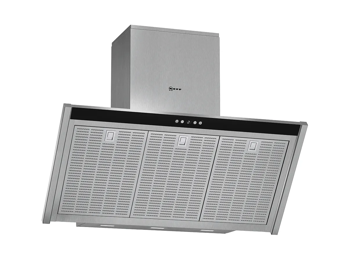 Front view of a stainless steel kitchen hood with a flat design and mesh filters, featuring control buttons at the top. It is mounted above a cooktop, adding a modern touch to the kitchen design.