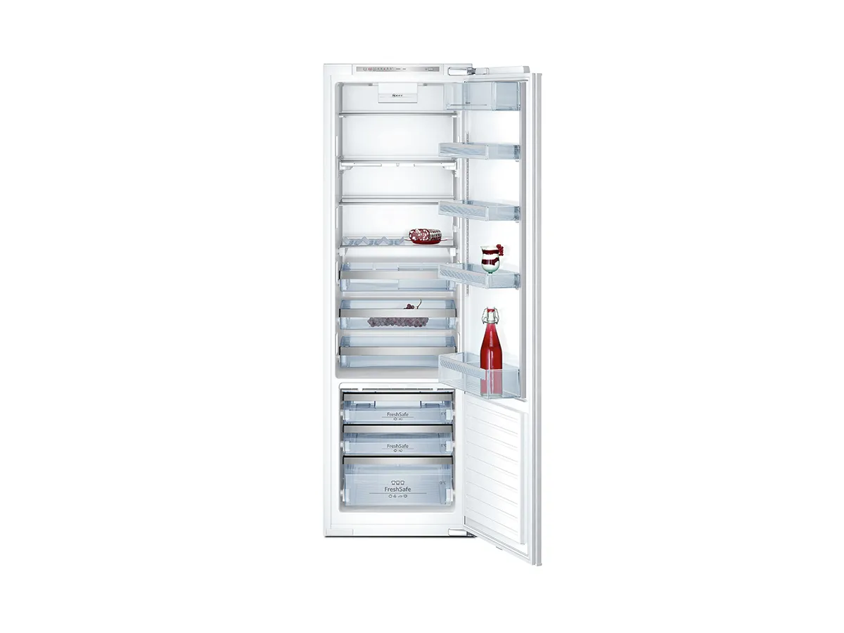 Upright refrigerator with glass shelves, drawers, and interior lighting.