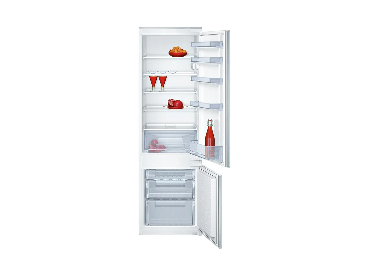 Refrigerator with shelves, drawers, and various food items visible inside.