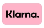 Klarna-logo met dikke zwarte letters op een zachtroze achtergrond, symbool van een moderne betaaloplossing.
