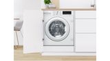 Bosch Frontlader-Einbau-Waschmaschine in einer modernen wei&szlig;en K&uuml;che