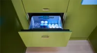 thermador kips bay new york decorator show house hundiford design studio green loft under counter drawer open
