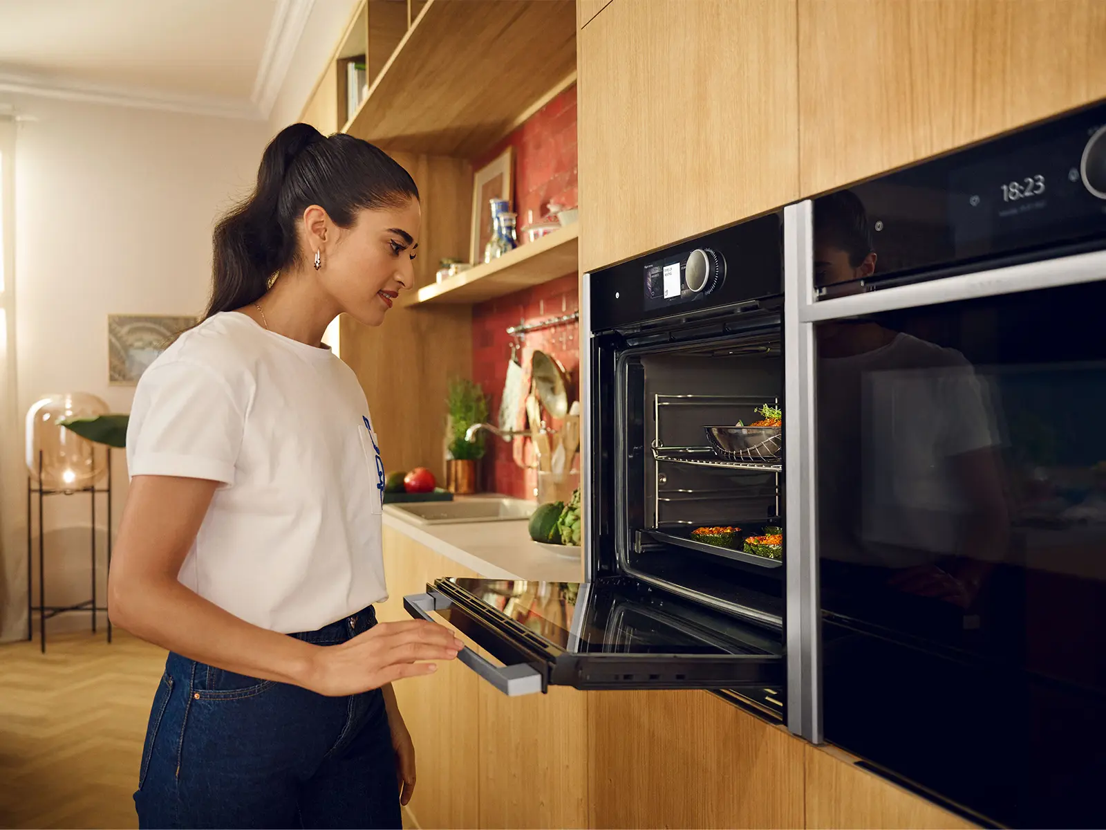 Person opening a Neff oven