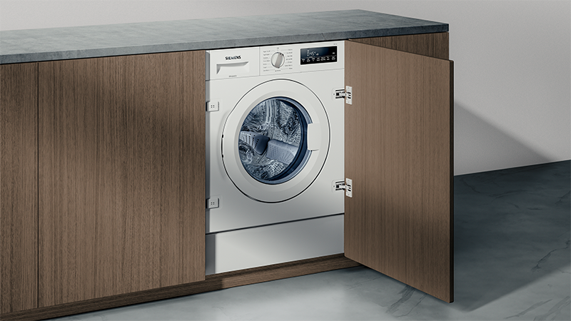 Integrated washer dryer