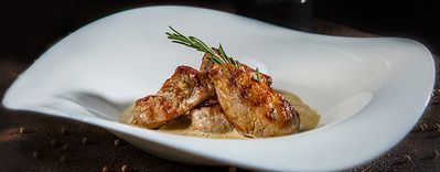 Pork medallion in a white plate