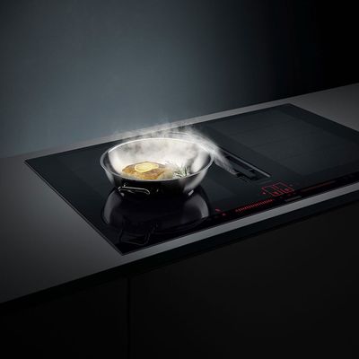 Vented induction hob in use