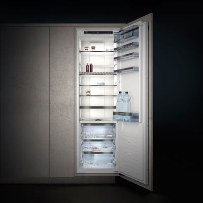 Fridge freezer with door open showing interior
