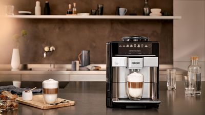 Siemens Coffeeworld - Koffiebonen op een houten bord