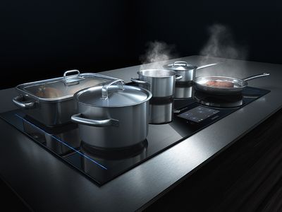 Side view of pots and pans using induction air plus
